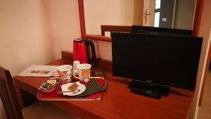 Et tv og/eller underholdning på Boni room and breakfast