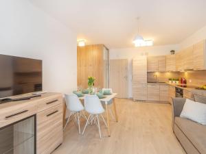 Kuchyňa alebo kuchynka v ubytovaní Feniks Apartament