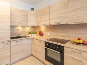 Kuchyňa alebo kuchynka v ubytovaní Feniks Apartament