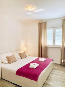 Postel nebo postele na pokoji v ubytování Diamant Apartments