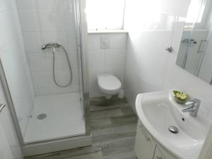 Koupelna v ubytování Diamant Apartments
