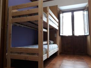 Postel nebo postele na pokoji v ubytování Albergue La Vargona + 4 fotografie
