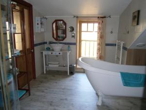 Koupelna v ubytování chambre d'hôte atypique "West little ranch" chambre amérindienne