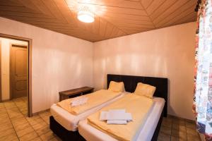 Letto o letti in una camera di Chalet Fernblick - Panoramic view