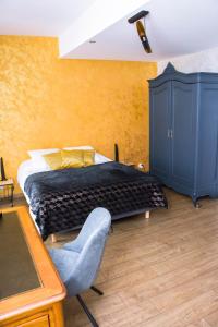 Postel nebo postele na pokoji v ubytování La Chambre Enchantée