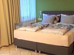 Łóżko lub łóżka w pokoju w obiekcie Appartement Fischer
