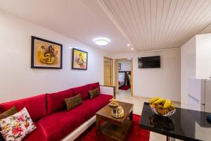TV a/nebo společenská místnost v ubytování Appart-hotel Marrakech Inn