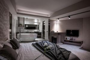 Ένα ή περισσότερα κρεβάτια σε δωμάτιο στο Two Easy Inn