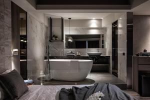 Ένα ή περισσότερα κρεβάτια σε δωμάτιο στο Two Easy Inn