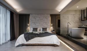 Ένα ή περισσότερα κρεβάτια σε δωμάτιο στο Two Easy Inn