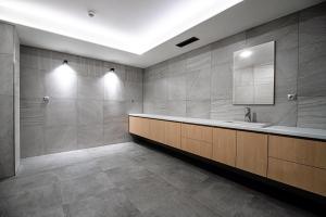 a bathroom with a sink and a mirror at Apartmán LIANA Hrebienok C107 in Smokovce +38 photos