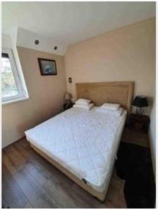 Posteľ alebo postele v izbe v ubytovaní Müller Apartman