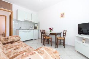 Kuchyňa alebo kuchynka v ubytovaní Apartments Krajina