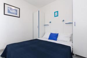 Posteľ alebo postele v izbe v ubytovaní Apartments Krajina