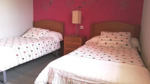 Posteľ alebo postele v izbe v ubytovaní P.B. Apartamento
