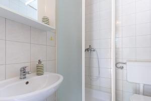 Kúpeľňa v ubytovaní Apartments Krajina