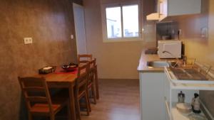 Kuchyňa alebo kuchynka v ubytovaní P.B. Apartamento + 23 fotografií