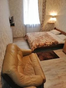 Ліжко або ліжка в номері Apartments near Rynok Square