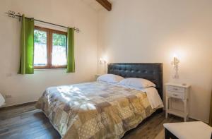 Кровать или кровати в номере Villa Le Favole