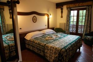 Postel nebo postele na pokoji v ubytování Hotel Milleluci