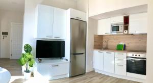 A kitchen or kitchenette at Pequeño paraíso frente al mar Playa Chica