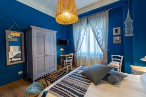 Posteľ alebo postele v izbe v ubytovaní il Palchetto B&B di Charme e Design