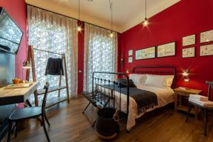Posteľ alebo postele v izbe v ubytovaní il Palchetto B&B di Charme e Design