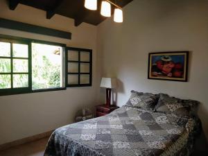 Ένα ή περισσότερα κρεβάτια σε δωμάτιο στο Casa de Campo Vaqueros Salta