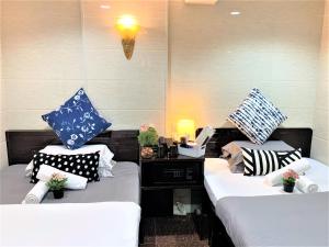 Katil atau katil-katil dalam bilik di Metrocity Lounge