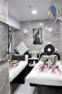 Katil atau katil-katil dalam bilik di Metrocity Lounge
