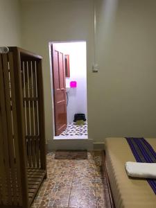 Manel Guesthouse and Restaurant客房内的一张或多张床位