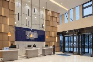The lobby or reception area at Holiday Inn Express Shanghai Huijin, an IHG Hotel