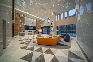 Posezení v ubytování Holiday Inn Express Shanghai Huijin by IHG