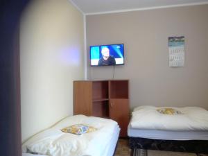 Łóżko lub łóżka w pokoju w obiekcie Noclegi16