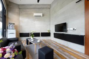 TV o dispositivi per l'intrattenimento presso Donggang Jingdi B&B