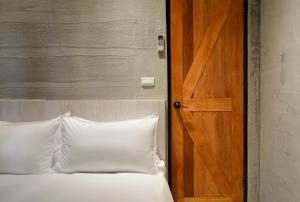 Letto o letti in una camera di Donggang Jingdi B&B
