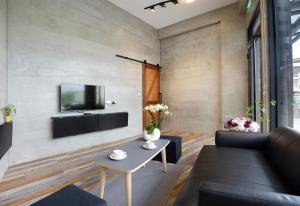 TV o dispositivi per l'intrattenimento presso Donggang Jingdi B&B