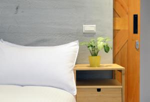 Letto o letti in una camera di Donggang Jingdi B&B