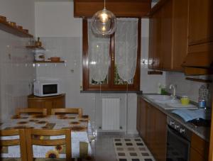 Η κουζίνα ή μικρή κουζίνα στο Casa di Mario e Natalina +14 φωτογραφίες