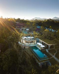 an aerial view of a resort with a swimming pool at Munduk Moding Plantation Nature Resort in Munduk