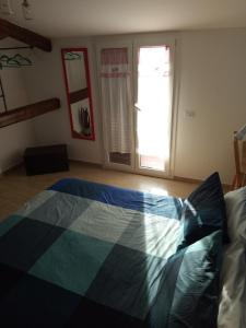 A bed or beds in a room at I Cavalieri di Malta