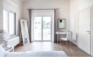 Postel nebo postele na pokoji v ubytování Villa Despina in Kisamos