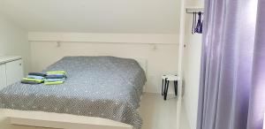 מיטה או מיטות בחדר ב-Family apartment Rita