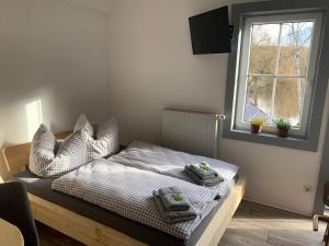 Postel nebo postele na pokoji v ubytování Landgasthof Wetteraperle