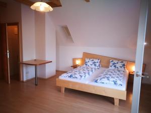Ένα ή περισσότερα κρεβάτια σε δωμάτιο στο Gästezimmer Steiner