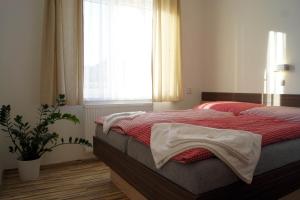 Posteľ alebo postele v izbe v ubytovaní Penzion Ranch