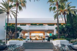 a group of bikes parked in front of a building at Iberostar Selection Marbella Coral Beach in Marbella