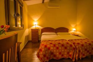 Postel nebo postele na pokoji v ubytování Casa Rural del Corral