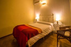 Postel nebo postele na pokoji v ubytování Casa Rural del Corral
