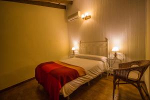 Postel nebo postele na pokoji v ubytování Casa Rural del Corral